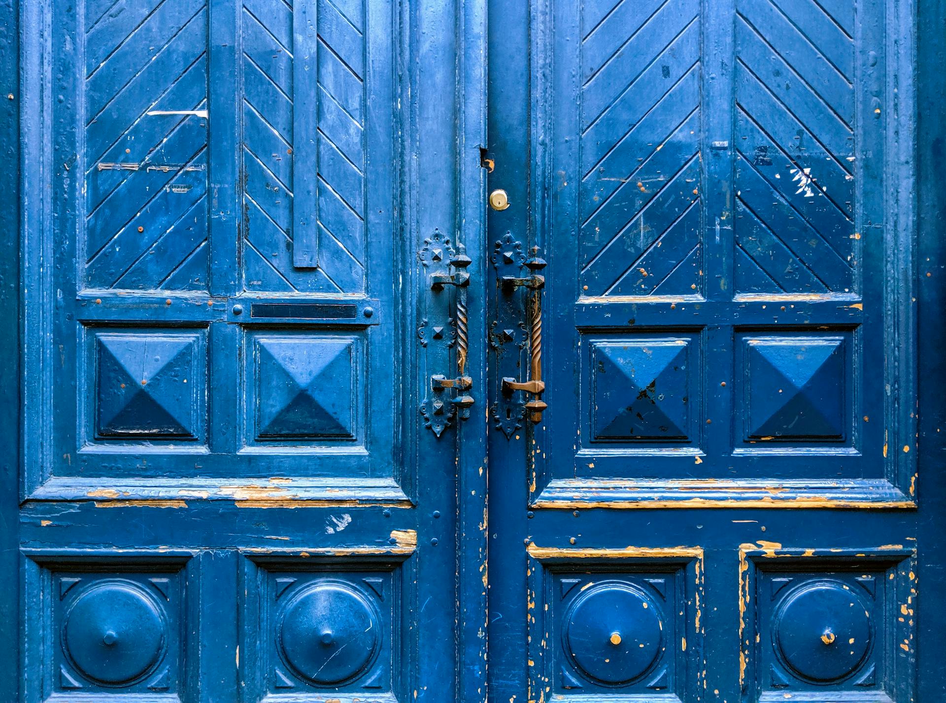 closed blue wooden doors
